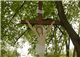 Dřevěný kříž s Kristem